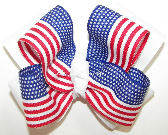Large hair bow with American flag design on a white background