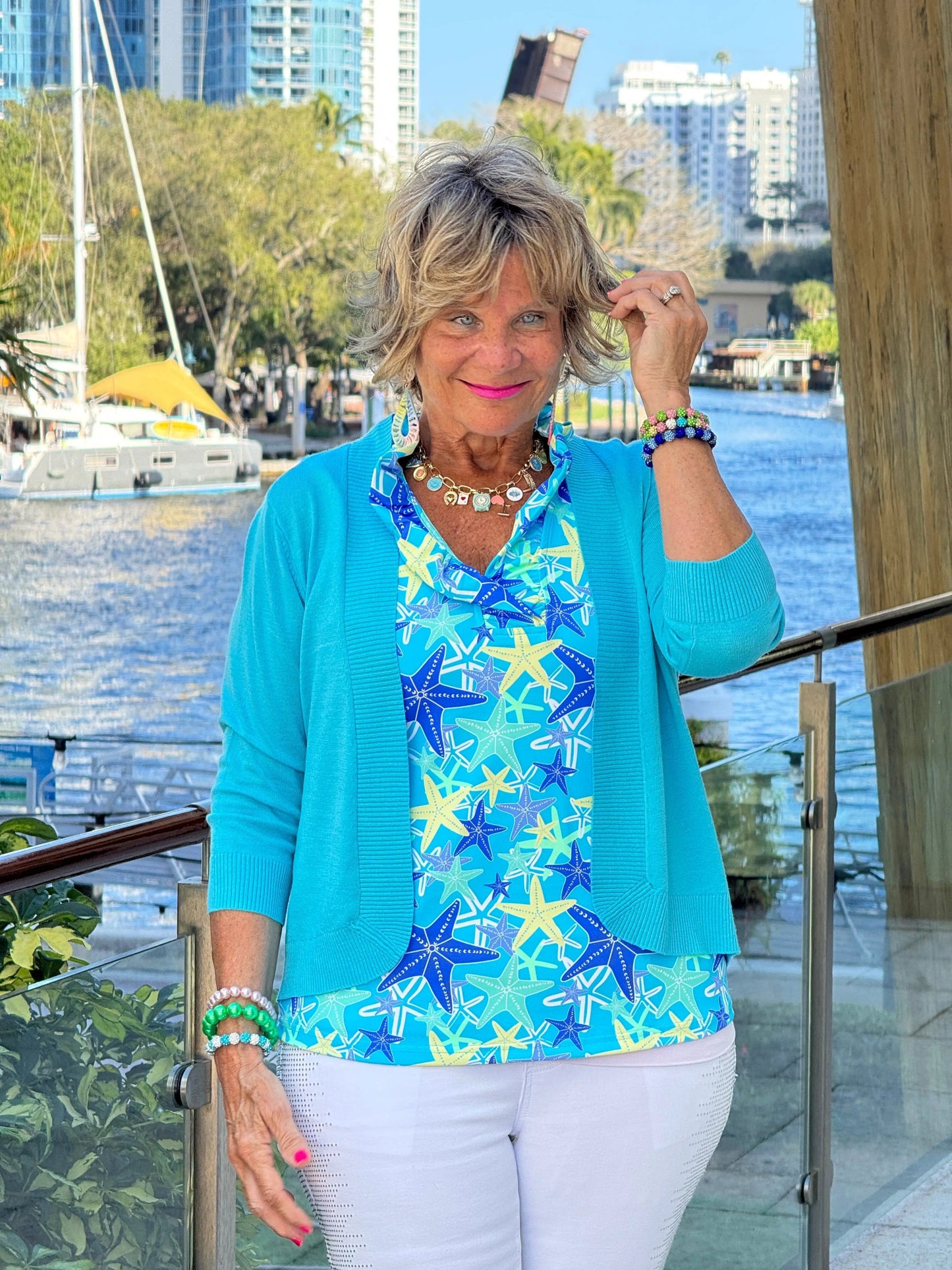 LULU B STARFISH SPLASH SLEEVELESS RUFFLE TOP
