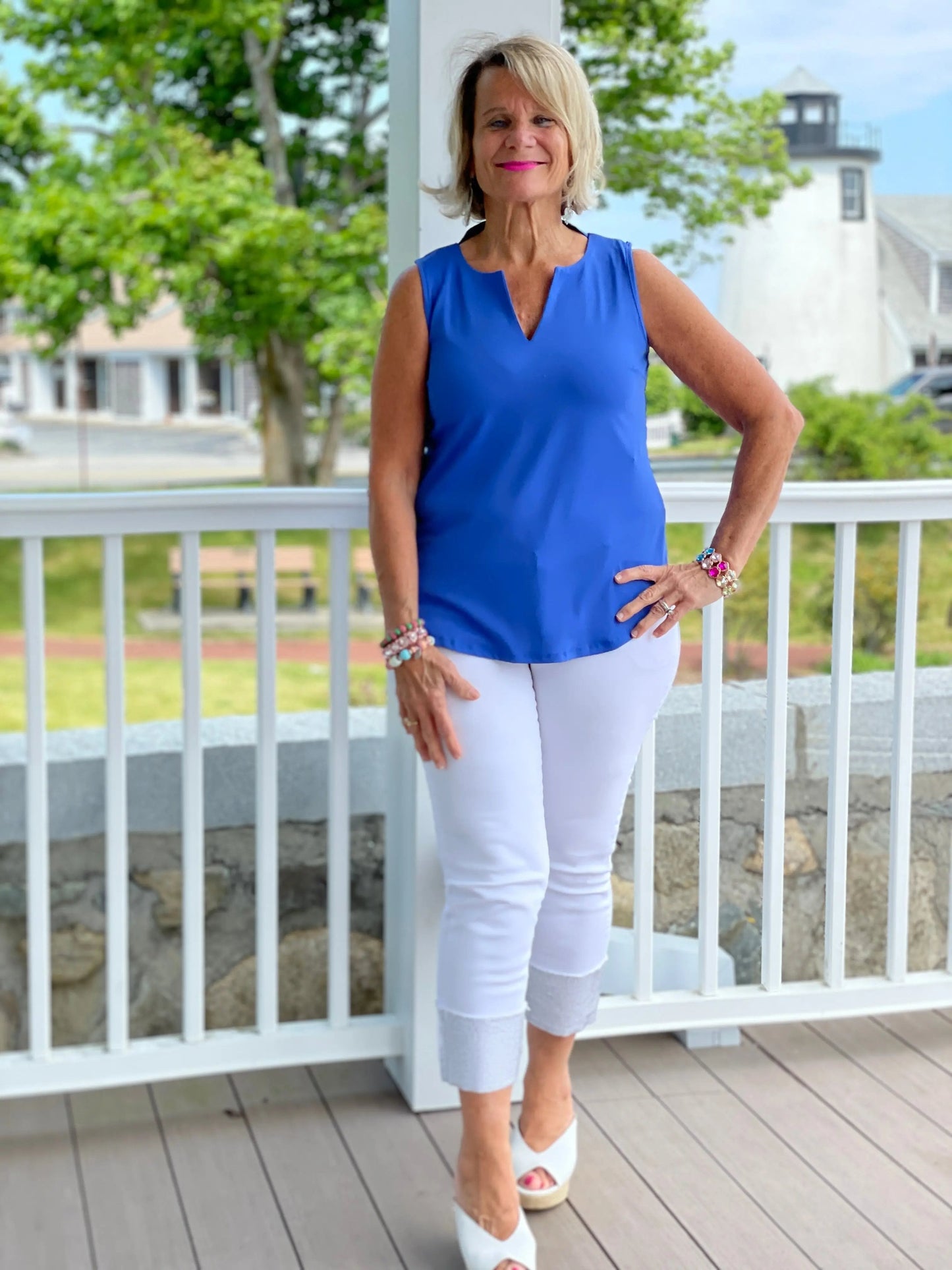 BLUE SLEEVELESS V-NECK TOP