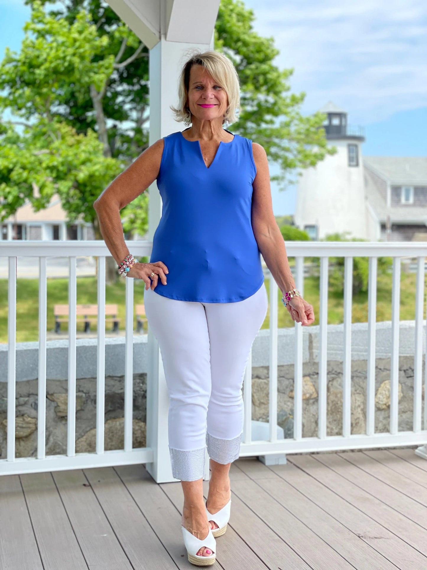 BLUE SLEEVELESS V-NECK TOP