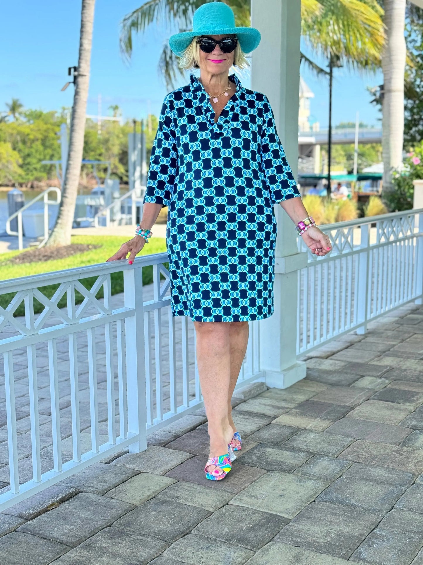 BLUE MEDALLION SLEEVE RUFFLE NECK DRESS