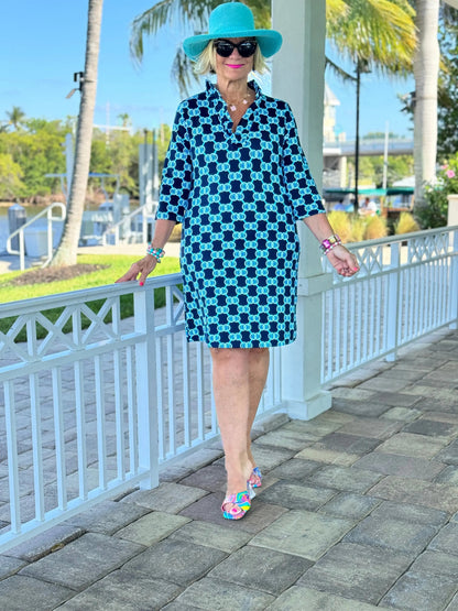 BLUE MEDALLION SLEEVE RUFFLE NECK DRESS