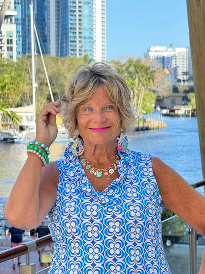 LULU B COASTAL BLOOM SLEEVELESS RUFFLE TOP