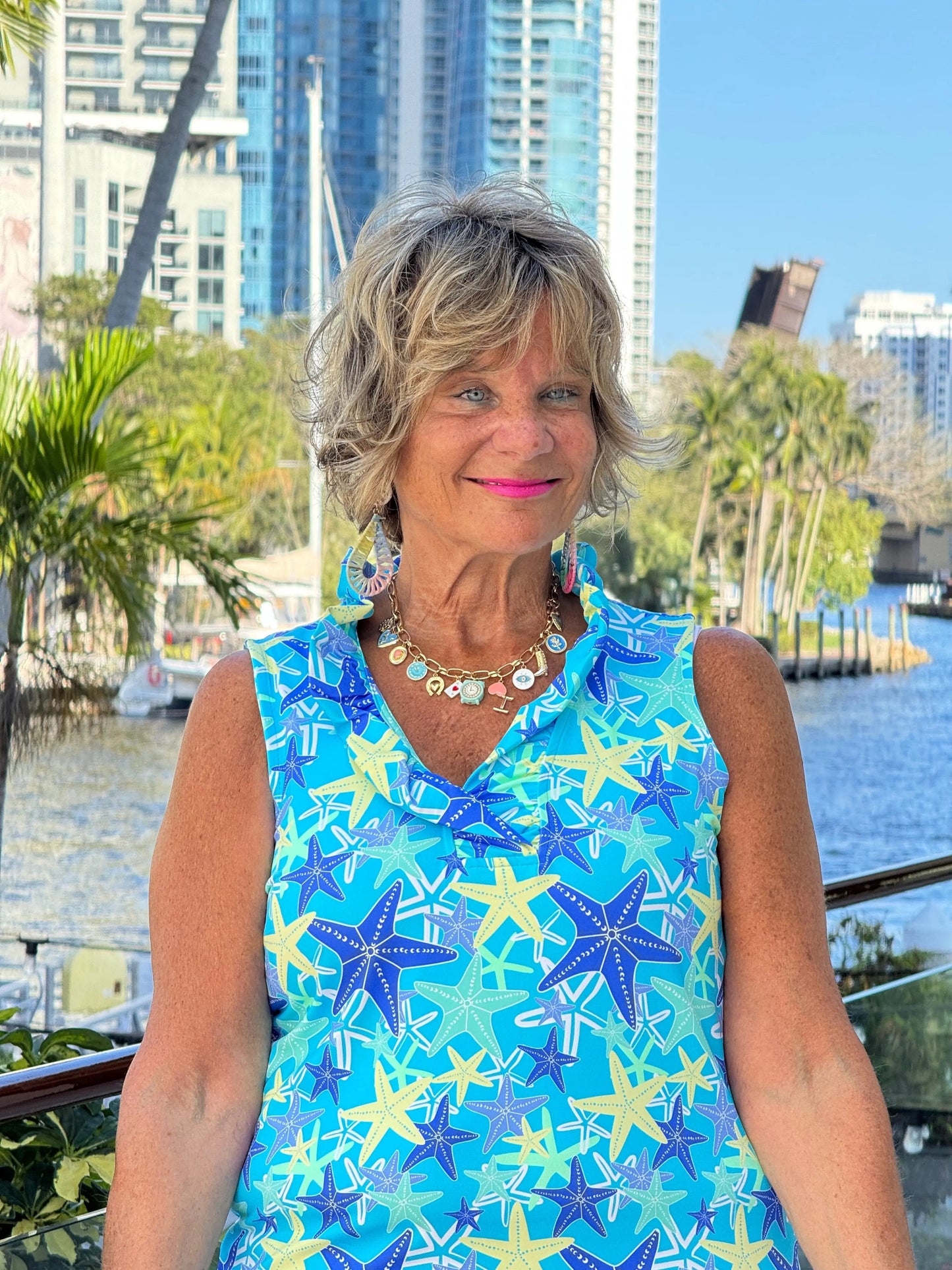 LULU B STARFISH SPLASH SLEEVELESS RUFFLE TOP
