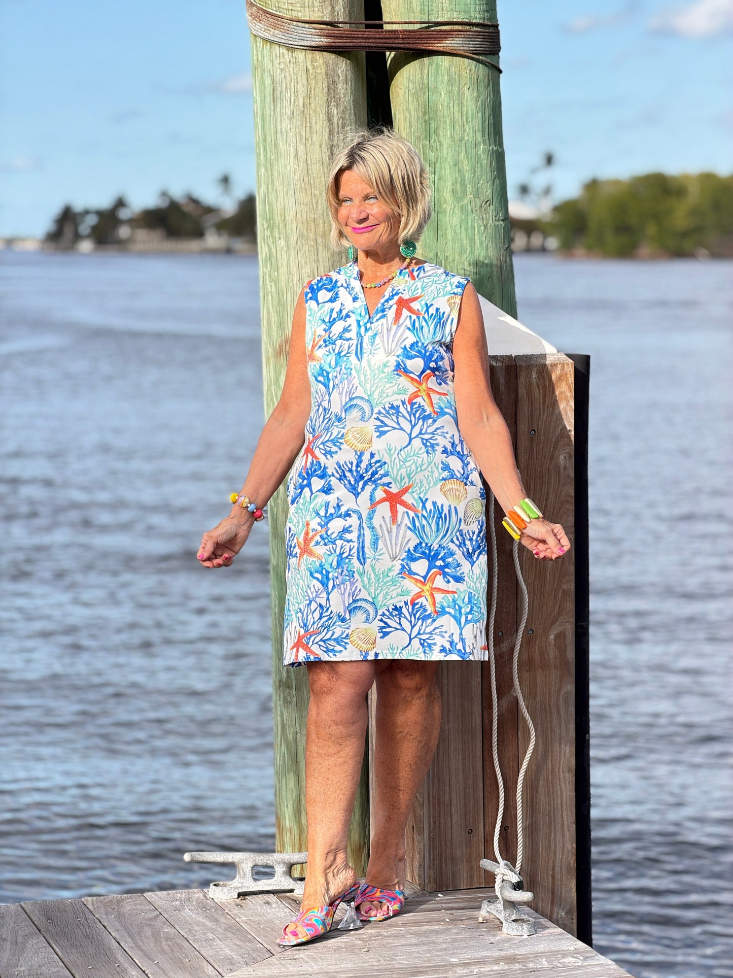 CORAL NOTCH SLEEVELESS UPF + 50 DRESS