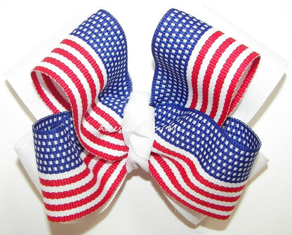 Large hair bow with American flag design on a white background
